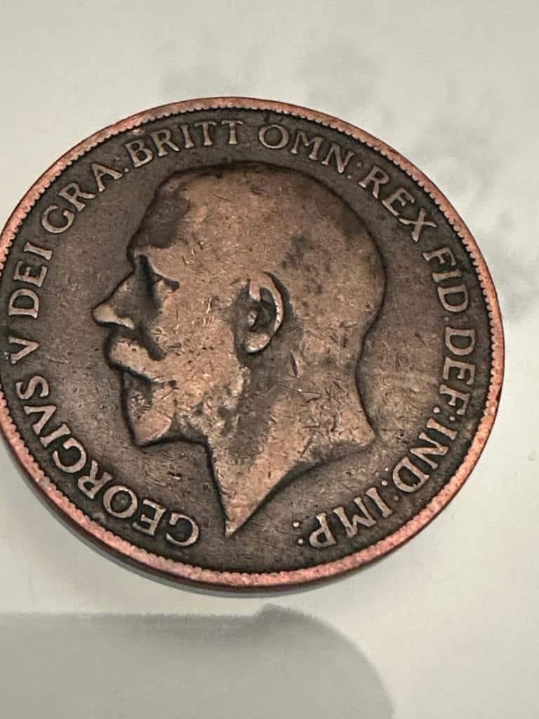 Estimation de la valeur monétaire et médaillon de 1911 : Comment évaluer le diamètre de 3 cm.