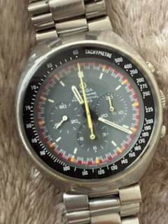 “Estimation de la valeur d’une Montre Omega vintage datant des années 1970 avec rayures d’usure sur le bracelet”