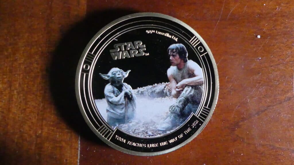 Estimation de 13 pièces de collection STAR WARS plaquées or Estimation de 13 pièces de collection STAR WARS plaquées or